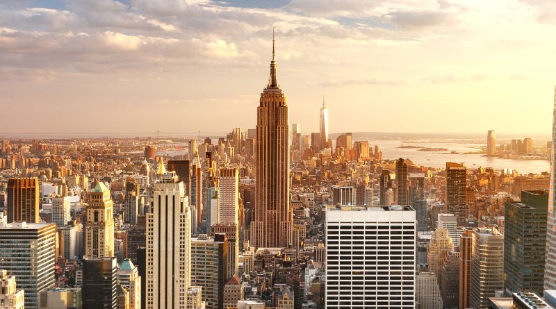 panoramic image of the New York skyline at sunset to support 262 Fifth Avenue article