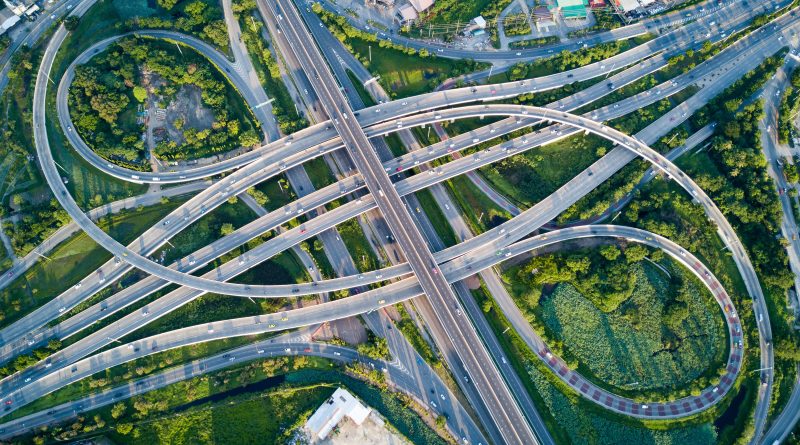 Birds-eye view image of a highway with various roads to support Buttigieg article