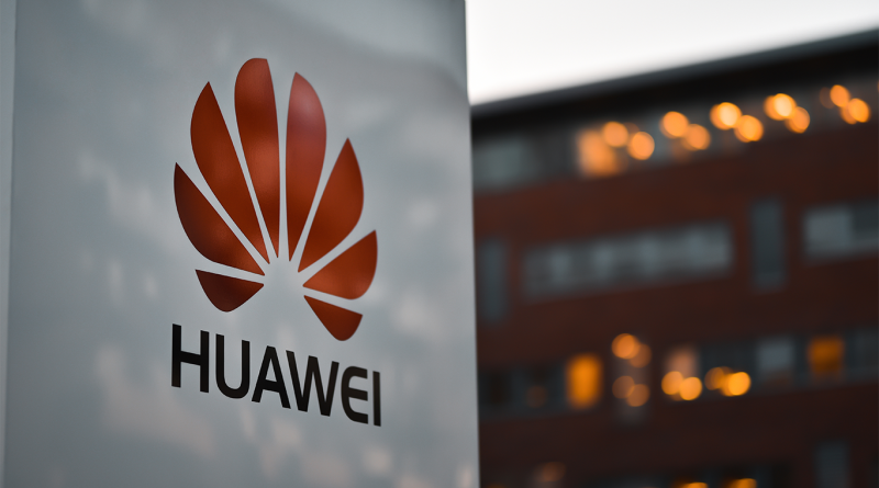 Huawei logo on building entrance to support semiconductor R&D article
