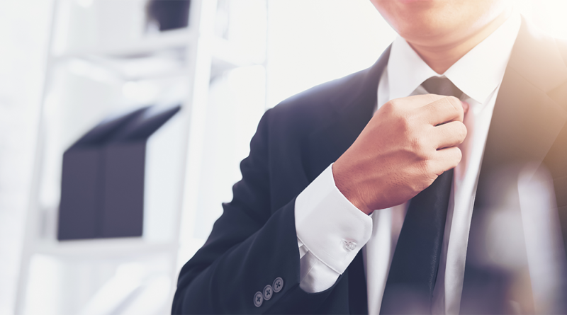 Close-up of professional man in suit to support Aggregate Industries new CEO article