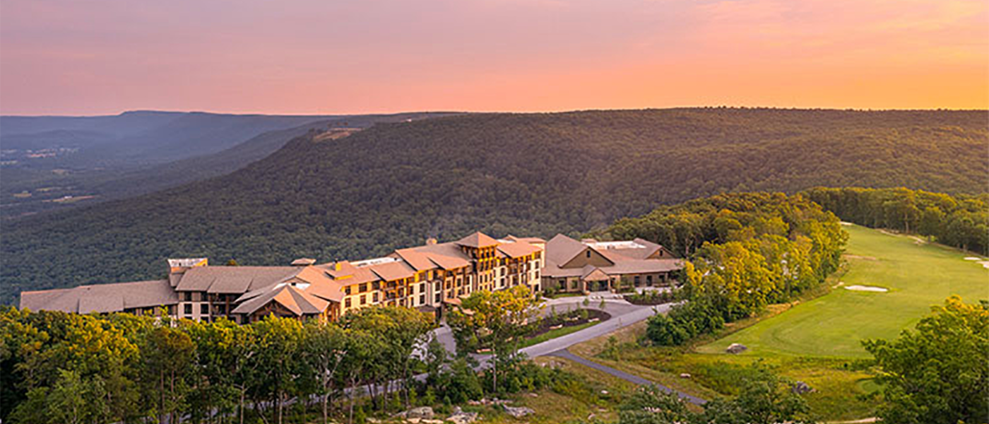 Home structure in rolling hills at sunset to support New South Construction article