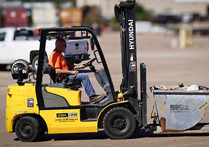 Yellow Hyundai fork lift truck