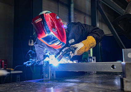 Welder at a bench