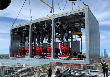 the crane-lifting of a large modular utility plant or pumping station.