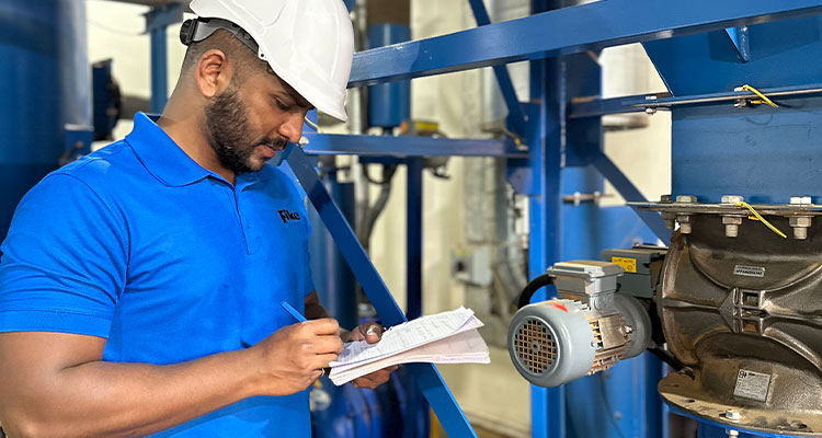 a person in a work environment performing a inspection task
