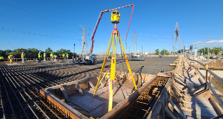 a bustling construction site, specifically showing the preparation for a concrete pour