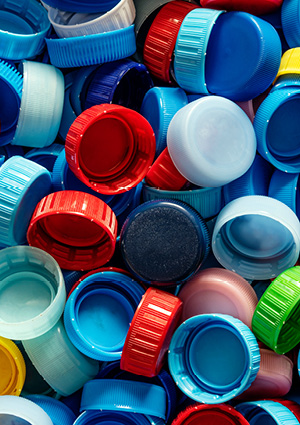 a large collection of assorted plastic bottle caps