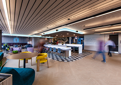 This image shows a contemporary office breakroom or cafeteria