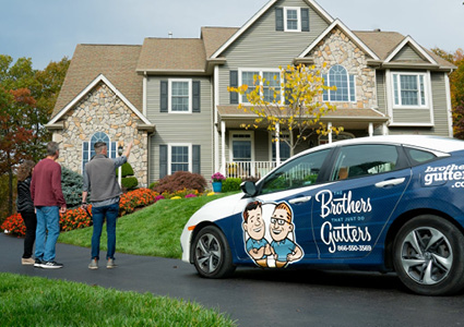 a service vehicle for The Brothers That Just Do Gutters, a gutter cleaning and repair franchise