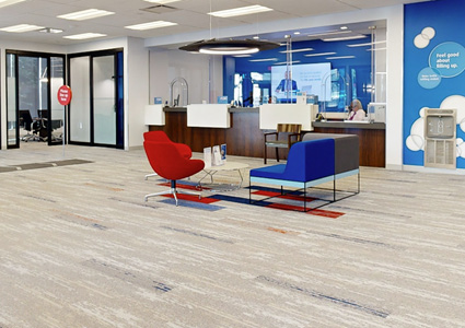the interior of a modern, spacious bank branch or corporate lobby