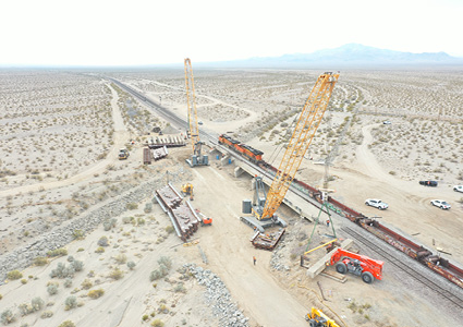 BNSF Railway crews and contractors replacing a 350-foot double-track bridge in Fenner, California