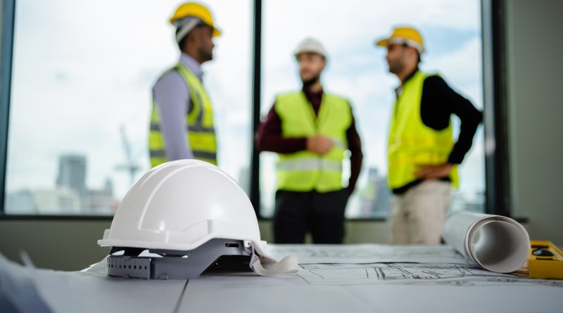 construction company owner talking to employees