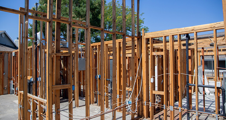 the rough-in construction phase of a timber-framed residential building