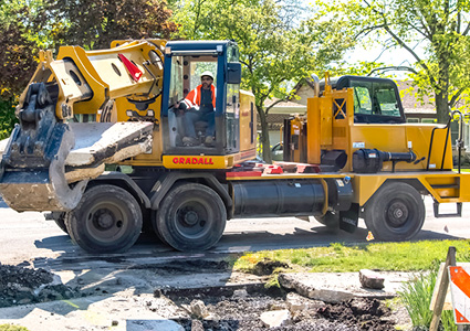a Gradall highway-speed wheeled telescopic excavator