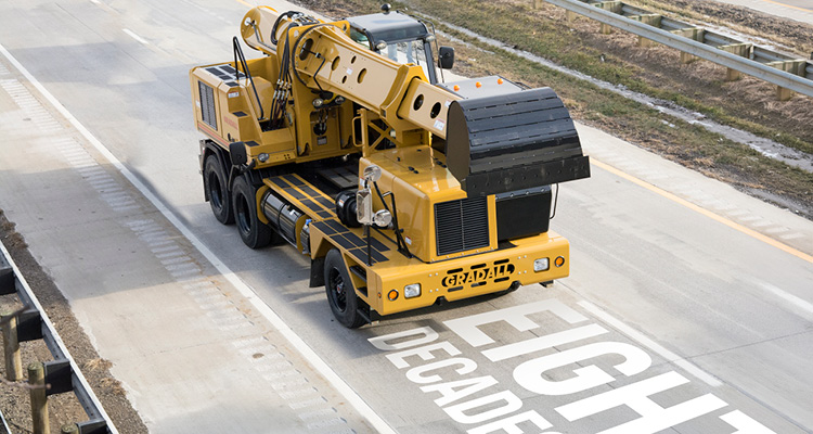 a Gradall highway-speed wheeled telescopic excavator